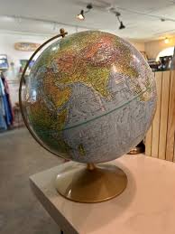 Vintage globe 12” diameter on brass stand – akin-cooperative