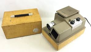 Sold at Auction: Vtg. Revere 555 Auto Magazine Slide Projector