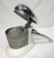 Sold at Auction: Juice-O-Mat Juicer