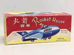 Sold at Auction: A vintage tin toy Rocket Racer, made in ...