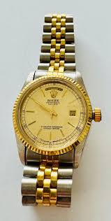 Sold at Auction: 2 wristwatches vintage Rolex and Lorus quartz