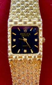 Womans Gold Rolex Watch Geneva Woven Gold Bracelet w/ Black Dial | WatchCharts Marketplace