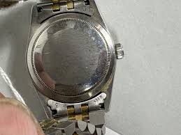 Sold at Auction: A ROLEX OYSTER PERPETUAL WATCH
