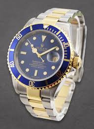 16613 used blue holed Rolex Submariner 2 Tone | Essential ...