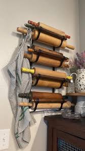 Repurposed Wine Rack to Hold Rolling Pins Love this!!! 🥰 spotted on Pinterest