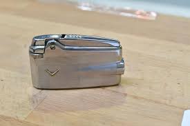 Sold at Auction: Large collection vintage lighters ...