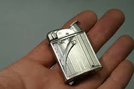 old vintage Evans U.S. cigarette cigar lighter flame fire ...