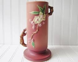 Sold at Auction: Roseville Pottery Green Apple Blossom Double Handled Vase