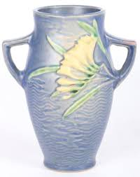 Sold at Auction: ROSEVILLE POTTERY FREESIA BLUE VASE 117-6