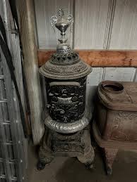 Several old wood stoves, anybody tell me what they are worth ...