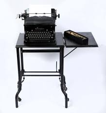 Sold at Auction: REMINGTON RAND TYPEWRITER & STAND
