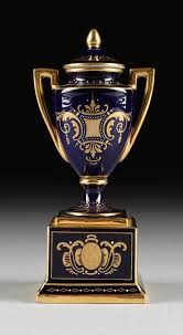 Lot - A GROUP OF FOUR ROYAL VIENNA STYLE PARCEL GILT COBALT PORCELAIN PIECES, AUSTRIA, MID-LATE 19TH CENTURY,