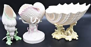 Sold at Auction: Three Belleek Shell Compotes, to include Nautilus with pink painted shell and coral, height 8 inches, having black mark; Imperial sh...