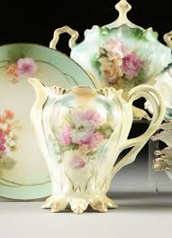 Lot - AN ASSORTMENT OF TWENTY R.S. PRUSSIA PORCELAIN TEA ...
