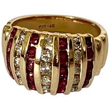 14k Clyde Duneier Ruby & Diamond Channel Set Vintage Dome Ring. For Sale at Ruby Lane