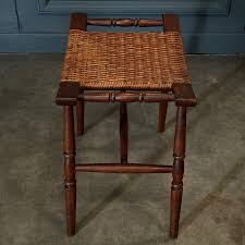 Oakwood turned wood and wicker stool 20th centu... | Antikeo