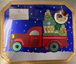 Russell stover holiday tin in Parma, OH - The Parma Flower Shop