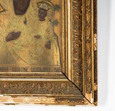 Lot - A Continental Religious Icon in Gilt Frame