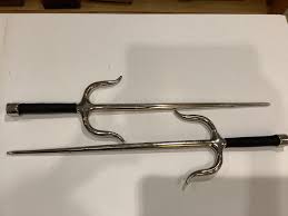 Sold at Auction: Pair Sai with leather holsters