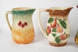 Lot - SIX ASSORTED MAJOLICA PITCHERS