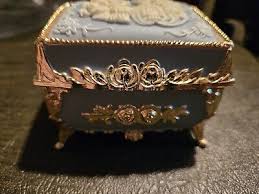 Haelo Gold Tone Blue Cameo Music Box That Plays Triumph | eBay
