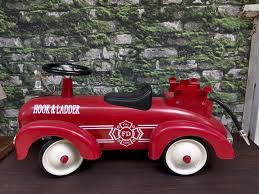 A child's ride on hook & ladder fire truck. Ideal for ...