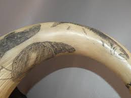 Sold at Auction: SCRIMSHAW MUSK OX HORNS