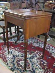 Lot - Mid century sewing machine cabinet