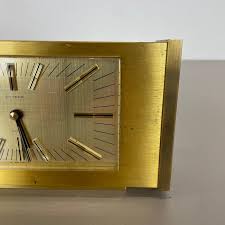 Vintage 1960s Hollywood Regency Solid Brass Table Clock Dugena, Switzerland at 1stDibs