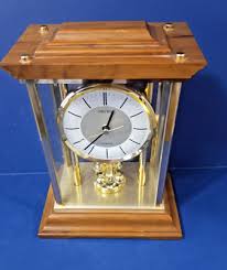 SEIKO TABLE OR MANTLE CLOCK WITH ROTATING PENDULUM (NOT ...