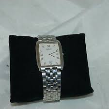 Seiko 7N39 5010 Water Resistant Silver Tone Rectangular White Dial Watch NICE! | WatchCharts Marketplace