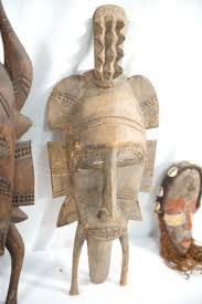 Sold at Auction: Collection of Vintage African Masks and Sculpture