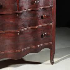 Sold at Auction: Antique serpentine front 4 drawer hardwood ...
