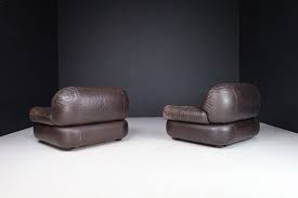 Couple of Lounge Chairs in Patinated Brown Leather by ...