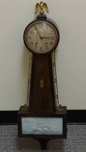 Lot - Gilbert 8-Day Banjo Wall Clock, H: 29 in