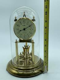 Sold at Auction: JUNGHANS GLASS DOME GERMAN ANNIVERSARY CLOCK