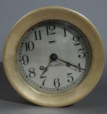 Lot - Brass Round Ship's Clock, W: 7 1/4 in. (18.4 cm.)