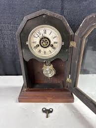 Sold at Auction: Vintage clock in wood case with pendulum manufactured by E. Ingraham & Co. with Ken to wind clock, works, 15.5” x 10” x 5”