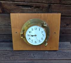 Cool Brass Housing Mounted on Wood Battery Operated Wall ...