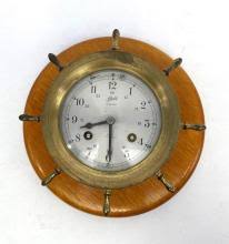 Sold at Auction: A Schatz Ships Bell Brass Clock, Timber Plaque