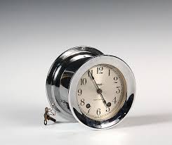 Lot - MARINE CLOCK - Seth Thomas 'Mayflower 3' Ship's Clock in nickel plated case, with key. 3 1/2" x 5 1/4" diam. Good condition.