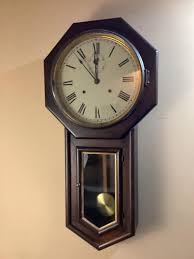 Sold at Auction: Seth Thomas Long Drop in Octagonal Mahogany Case