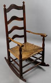 Lot - CHERRYWOOD AND MIXED WOODS LADDERBACK ROCKING CHAIR