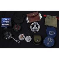 THREE FRESHWATER REELS together with a collection of freshwater flies, a leather pouch containing tr