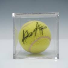 Sold at Auction: Tennis Ball Signed Andre Agassi in Display Case