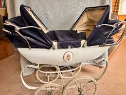 Help please! I have inherited this silver cross double dolls ...