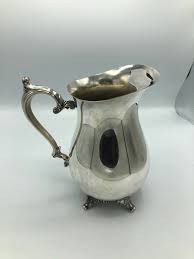 W.M. Rogers silver plated water pitcher with guard – The ...