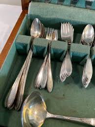 W M Rogers Silver Platted Set, Rose Pattern | EstateSales.org