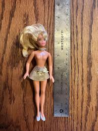 who is this? got it in a lot of Barbies from about 1997. says ...