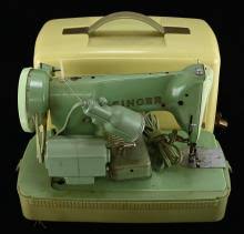 Sold at Auction: Mid Century Modern Singer Sewing Machine